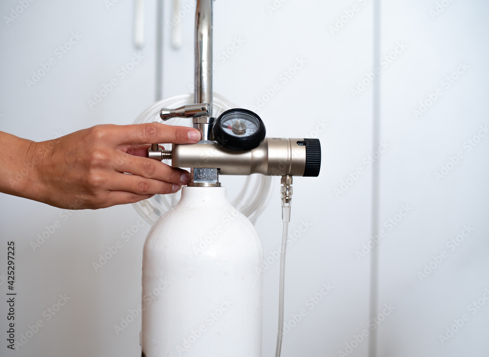 Oxygen breathing gas cylinder for using at home portable. Breathing device for asthma and coronavirus. Machine for old people who have problem with lungs. Oxygen breathing gas cylinder for using at home portable. Breathing device for asthma and coronavirus. Machine for old people who have problem with lungs.