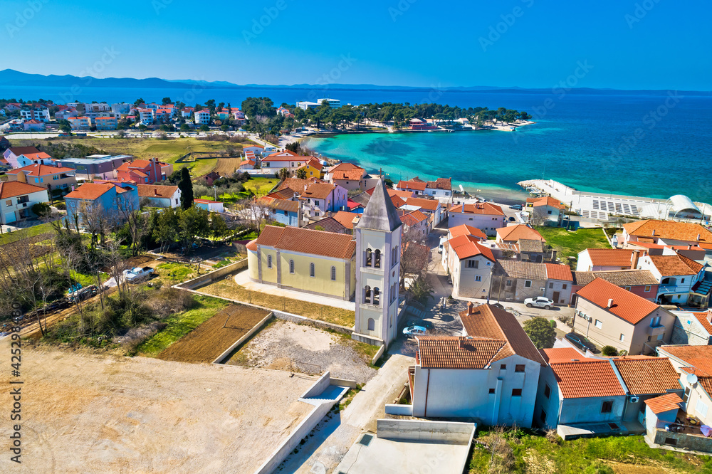 Petrcane village tourist destination church and waterfront aerial view