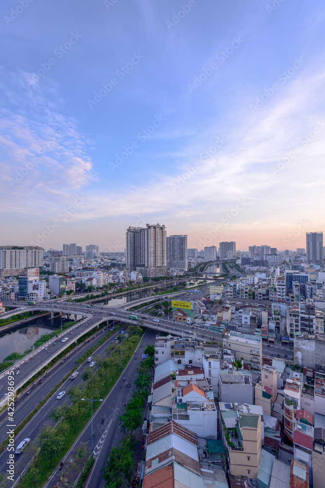 Fototapeta premium Photo done by the author in Ho Chi Minh City, Vietnam. Time: evening on April 22, 2021. Content: when the city lights up (Viet Nam)