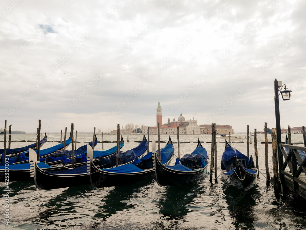 Fototapeta premium Blue gondolas in Venice