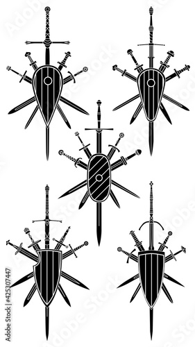 Set of simple black vector images of five crossed swords with medieval two-handed sword in center covered with shield.