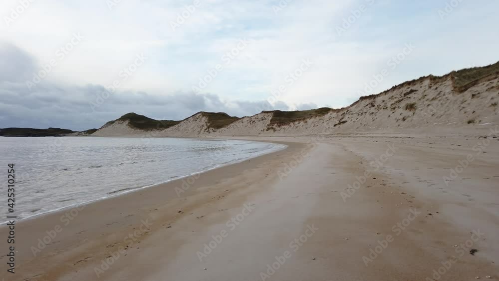 The beautiful dunes at Sheskinmore between Ardara and Portnoo during the winter in Donegal - Ireland. The beautiful dunes at Sheskinmore between Ardara and Portnoo during the winter in Donegal - Ireland.