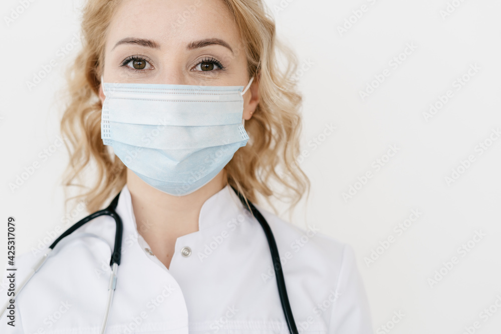 Doctor in white uniform against white background Doctor in white uniform against white background