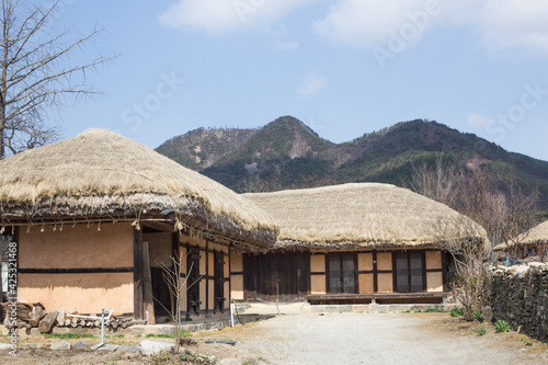 Obraz na plátně Traditional South Korean thatched roofed house