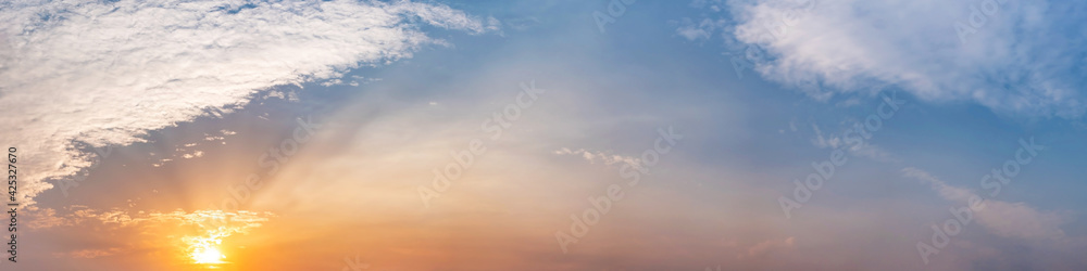Dramatic panorama sky with cloud on sunrise and sunset time. Panoramic image. Dramatic panorama sky with cloud on sunrise and sunset time. Panoramic image.