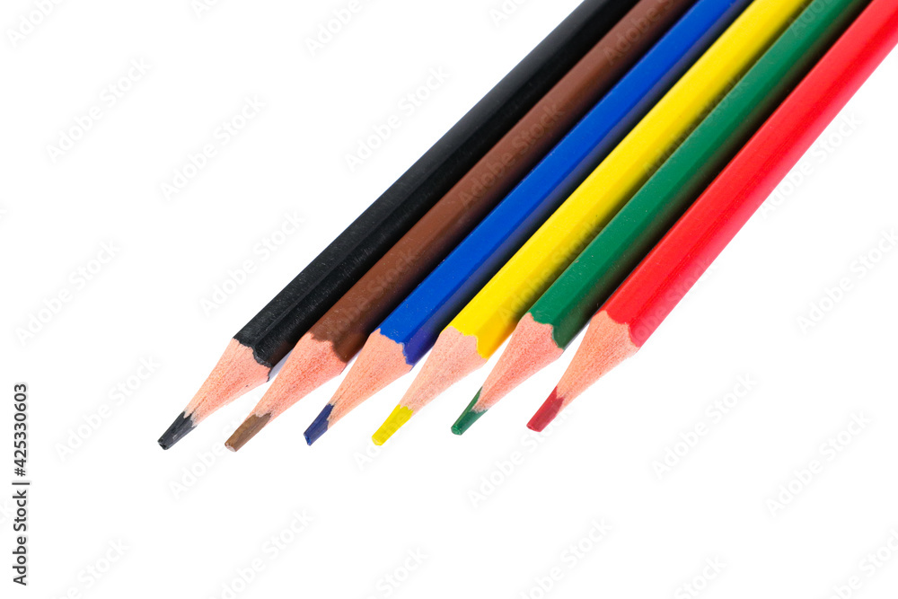 Colored pencils close-up on a white background, isolated Colored pencils close-up on a white background, isolated