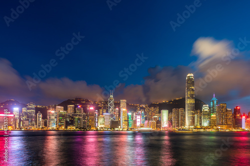 Hong Kong downtown skyline across Victoria harbor at night, Hong Kong, China. © kanonsky