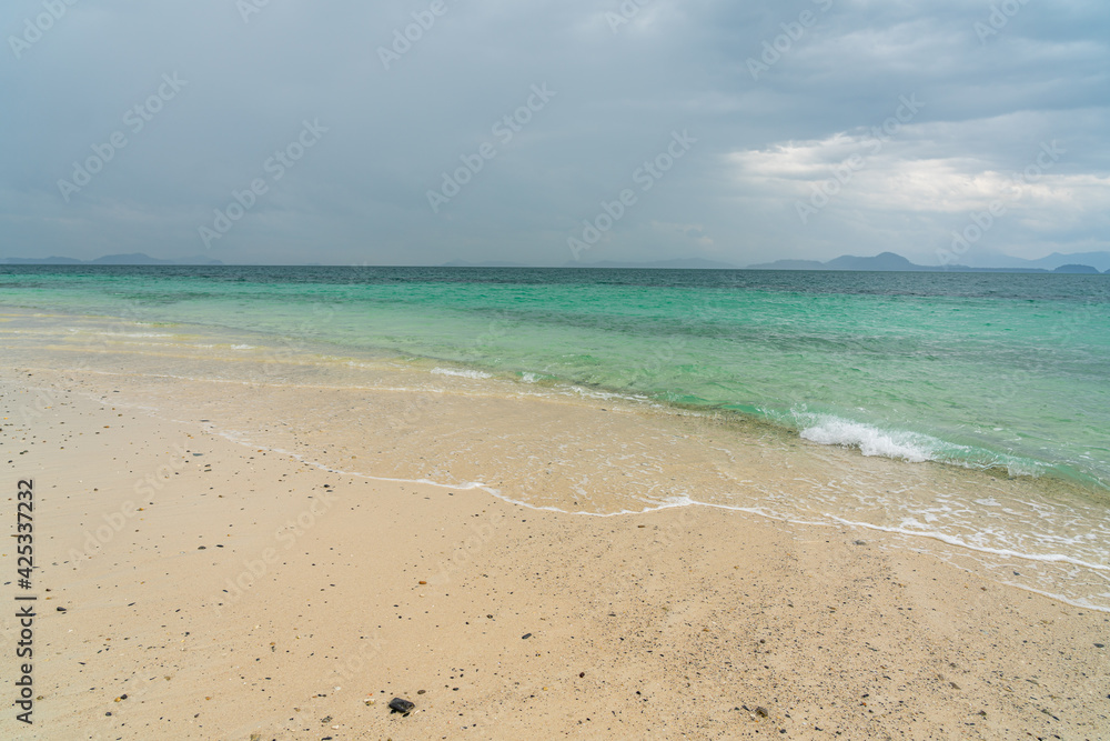 White sand beach in khang khao island, Ranong, Thailand in cloudy day.