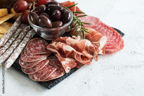 Charcuterie meat board on shale board