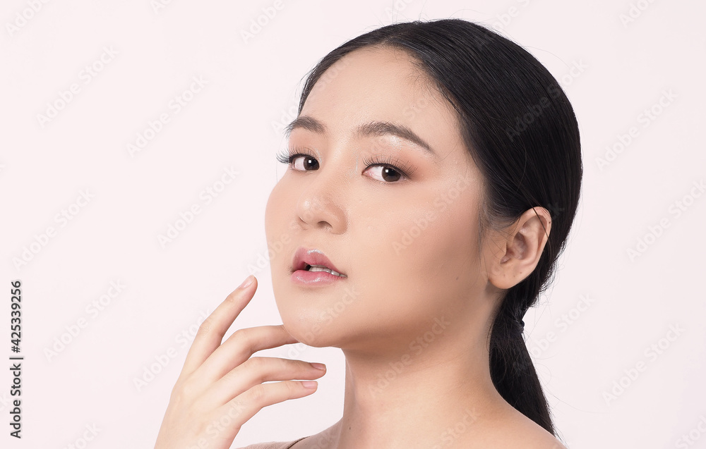 Beauty skin. makeup concept. Young pretty woman black hair and beauty face make up for skincare cosmetic. Showing delicate soft and firm and ageless facial skin. Oil type skin. Close up facial. Beauty skin. makeup concept. Young pretty woman black hair and beauty face make up for skincare cosmetic. Showing delicate soft and firm and ageless facial skin. Oil type skin. Close up facial.