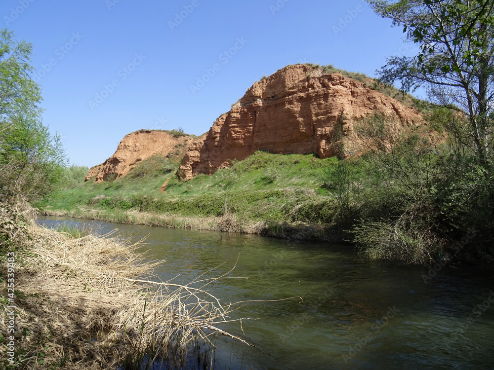 Landscape of the Henares riverside with clay cliffs during spring time in Azuqueca. Guadalajara. Spain.