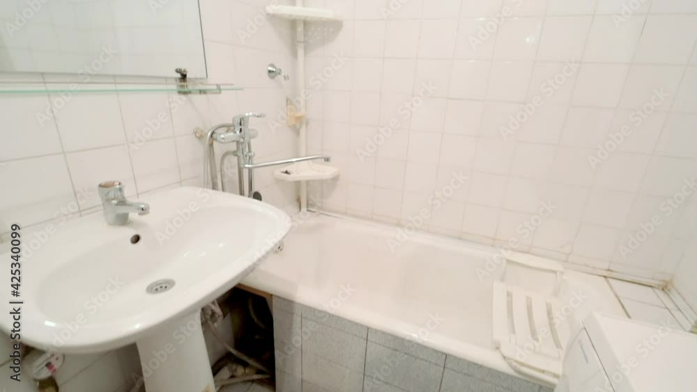 Russia, Moscow- April 25, 2020: interior room apartment modern bright cozy atmosphere. general cleaning, home decoration, preparation of house for sale. bathroom, sink, decor elements, toilet Russia, Moscow- April 25, 2020: interior room apartment modern bright cozy atmosphere. general cleaning, home decoration, preparation of house for sale. bathroom, sink, decor elements, toilet