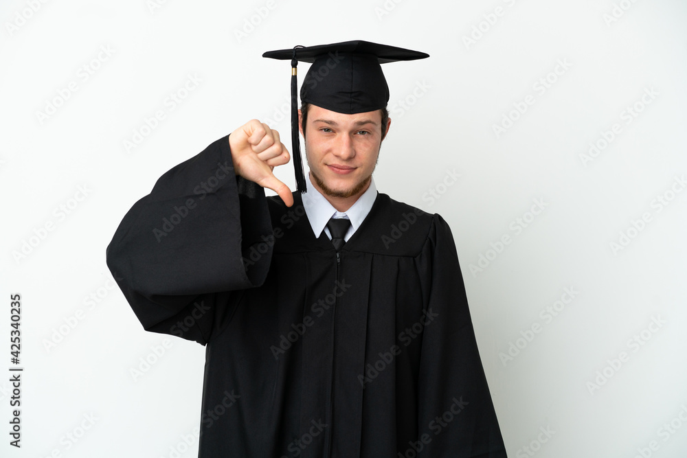 Young university Russian graduate isolated on white background showing thumb down with negative expression Young university Russian graduate isolated on white background showing thumb down with negative expression