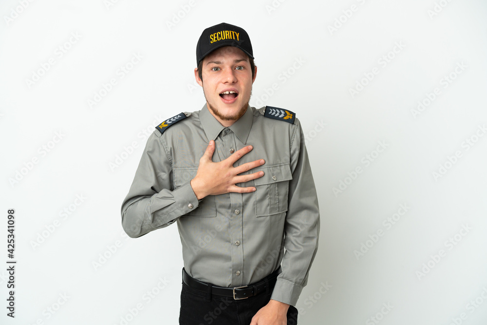 Young Russian security man isolated on white background surprised and shocked while looking right Young Russian security man isolated on white background surprised and shocked while looking right