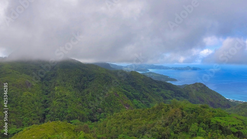Mahe   Seychelles. Aerial view of mountains and coastline on a foggy day
