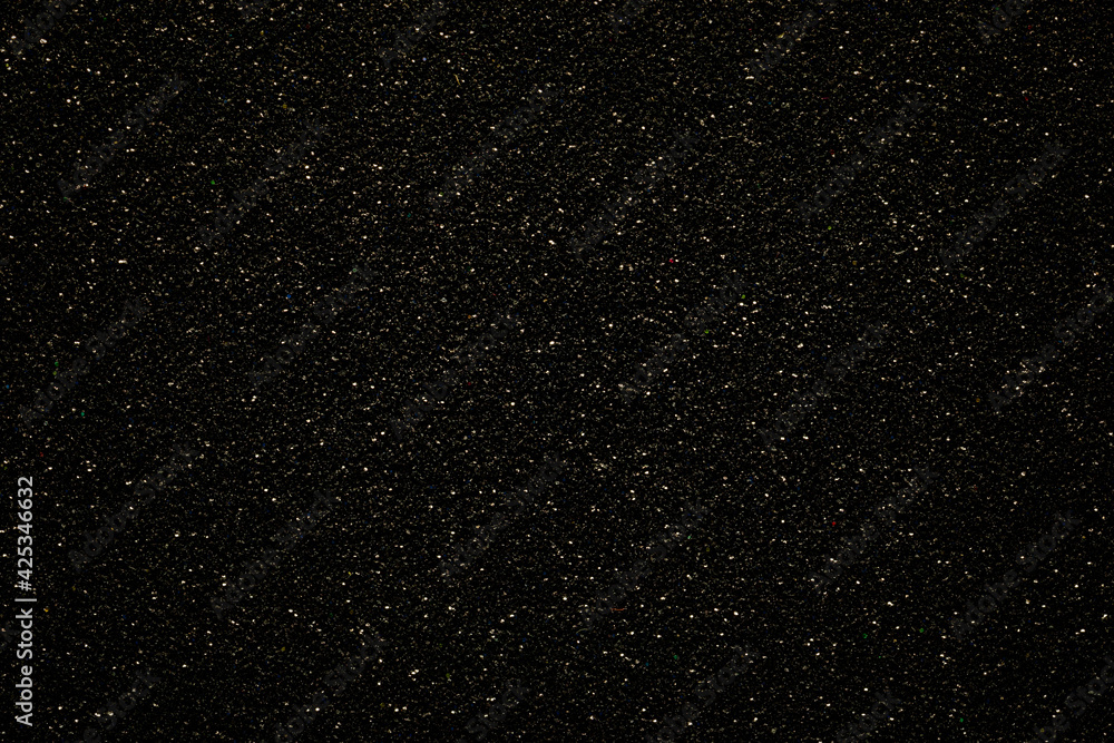 Black background with sparkling dots imitating space and endless distant stars