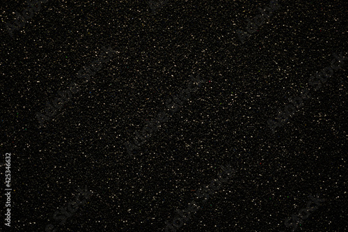 Black background with sparkling dots imitating space and endless distant stars