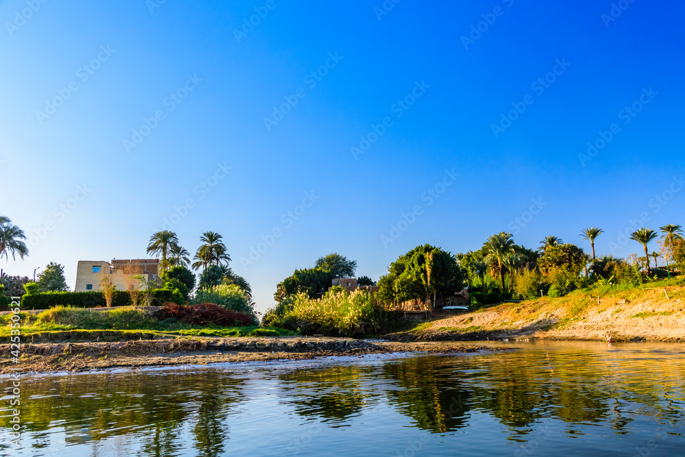 Residential buildings on a bank of the Nile river in Luxor, Egypt