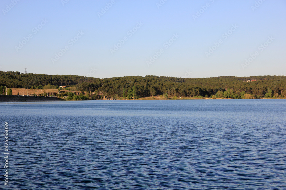 The landscape of big lake and forest