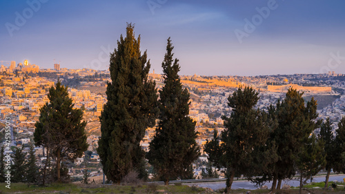View of the Old City Jerusalem, the Dome of the Rock and the Temple Mount seen through the trees across the valley; Sherover-Haas Promenade (Tayelet), Jerusalem photo