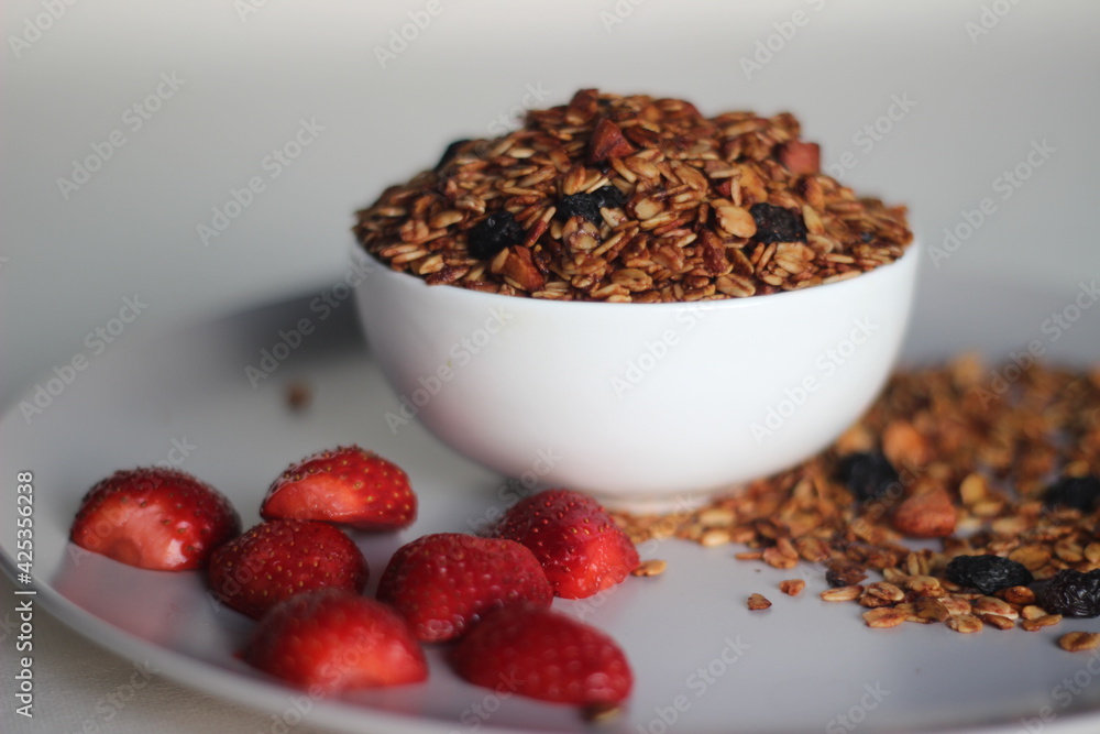 Strawberry granola. A breakfast option with milk or yogurt. Or as a healthy snack Strawberry granola. A breakfast option with milk or yogurt. Or as a healthy snack
