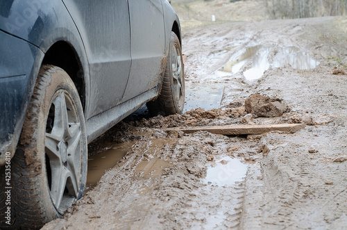 stuck car on a bad muddy road