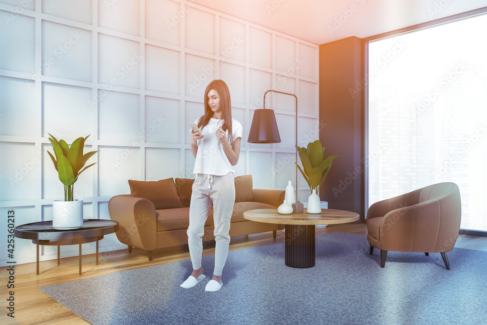 Atractive woman wearing white t-shirt is chating in living room Atractive woman wearing white t-shirt is chating in living room