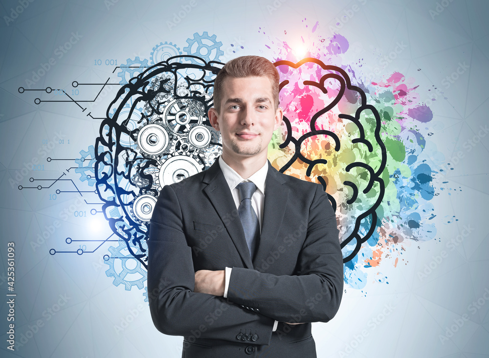 Positive successful businessman is smiling and having arms cross handed Positive successful businessman is smiling and having arms cross handed