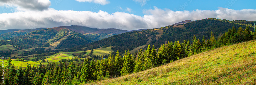 Landscape of mountains in a clear summer day. Panorama of a mountain range. Carpathians Ukraine. Landscape of mountains in a clear summer day. Panorama of a mountain range. Carpathians Ukraine.