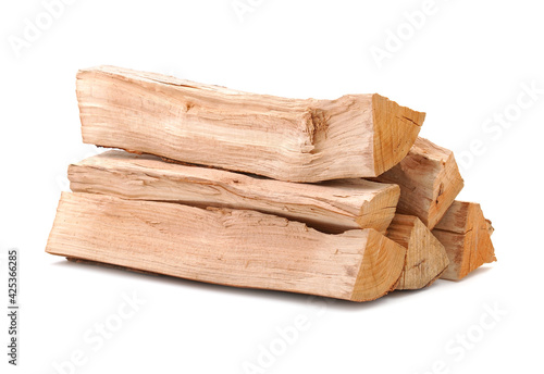 Tableau sur toile Pile of beech tree firewood isolated on white