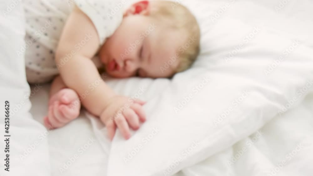 measure the temperature of a little baby. selective focus. measure the temperature of a little baby. selective focus.