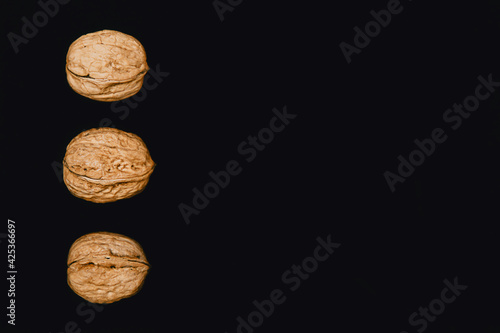 walnut on a colored background with a place for the text photo