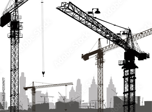 group black large cranes build house