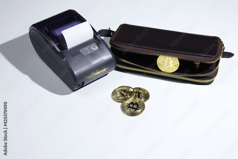 cash register with gold bitcoin coins isolated on white background. cash register and coins bitcoin concept. trade and finance. cash register with gold bitcoin coins isolated on white background. cash register and coins bitcoin concept. trade and finance.