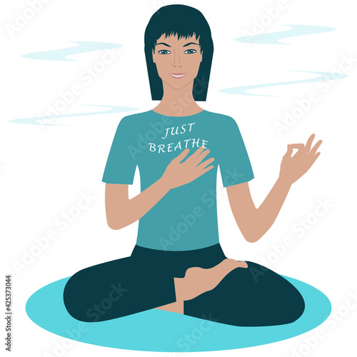 A man sits in an asana pose, an abstract breeze - the inscription on the T-shirt - Just breathe. Breathwork. Mental health. Respiratory therapy.