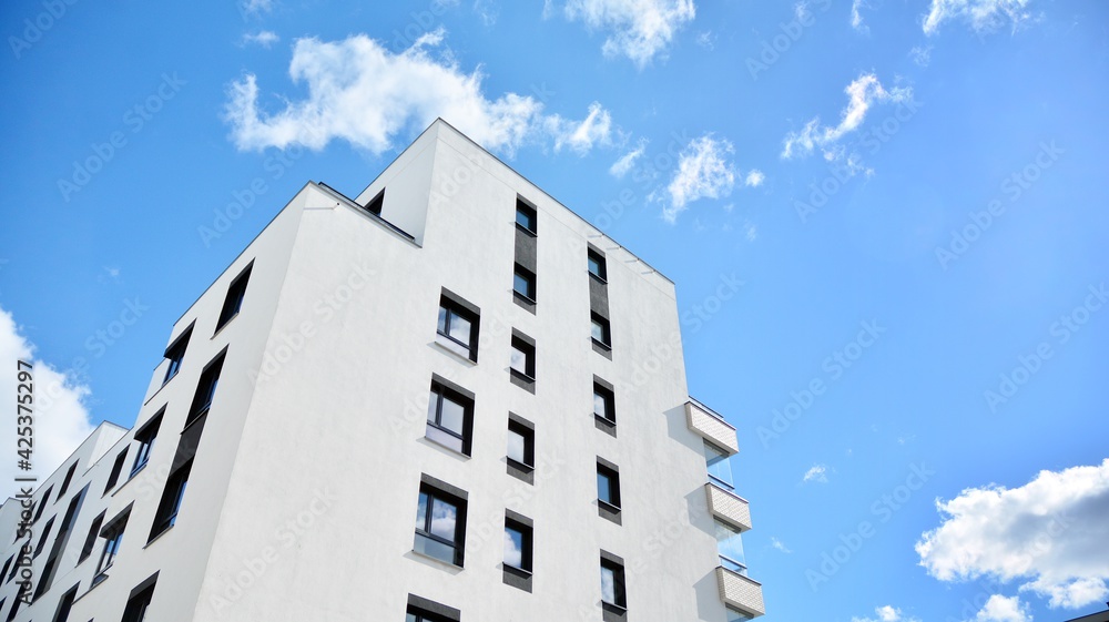 Multistoried modern, new and stylish living block of flats. Newly built apartment building. Multistoried modern, new and stylish living block of flats. Newly built apartment building.