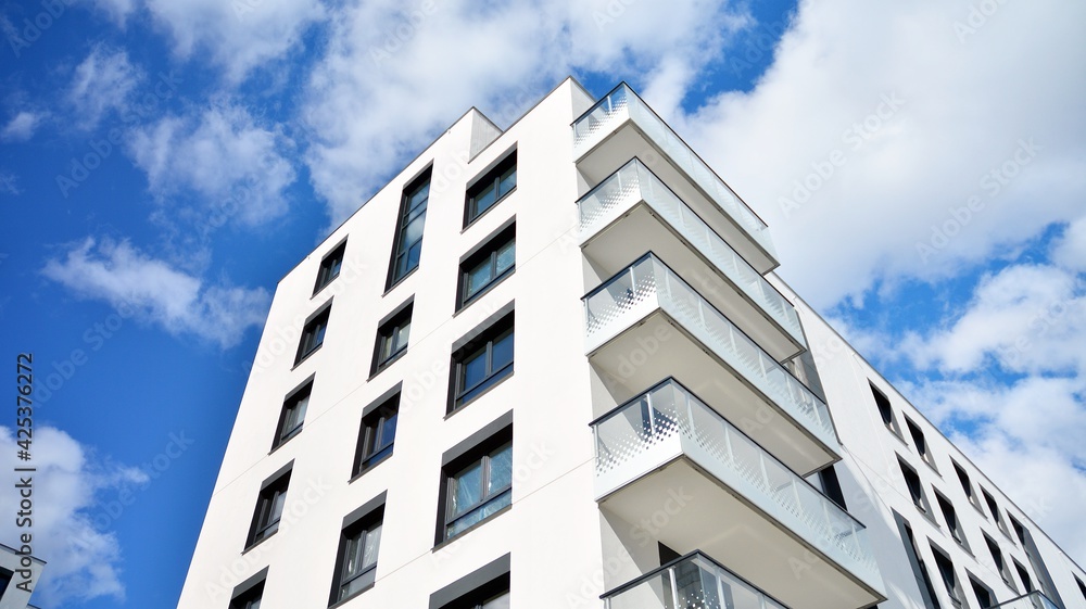 Multistoried modern, new and stylish living block of flats. Newly built apartment building. Multistoried modern, new and stylish living block of flats. Newly built apartment building.