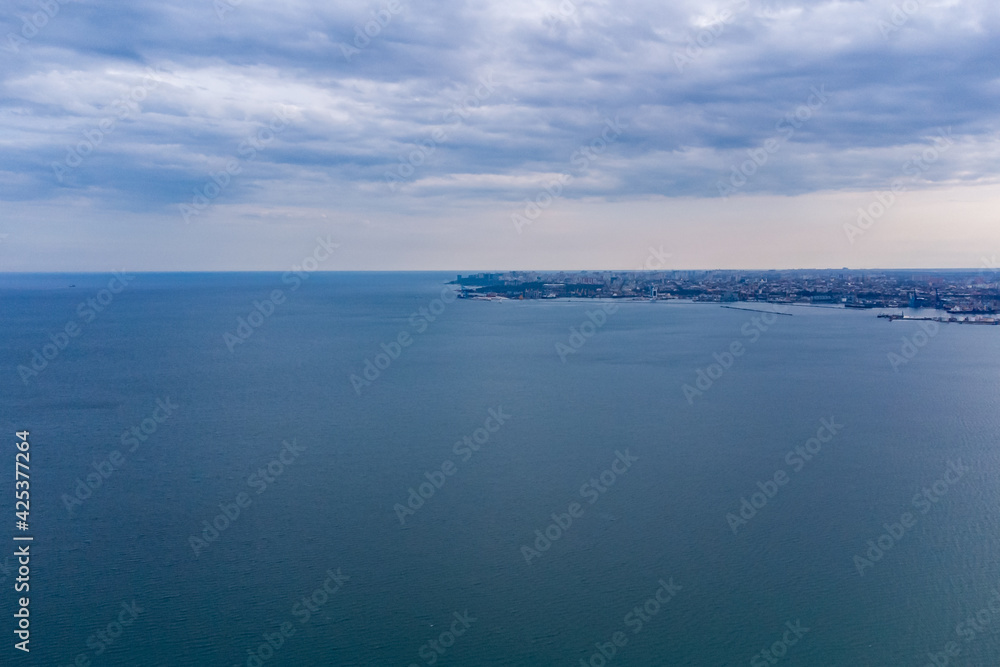 View of the city of Odessa, Luzanovka beach, Black Sea and Kuyalnitsky estuary. Photo from a helicopter.