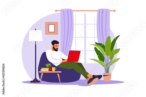 Man sitting with laptop on bean bag chair. Concept illustration for working, studying, education, work from home. Flat. Vector illustration.