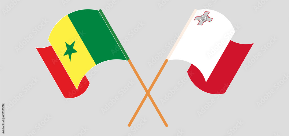 Crossed and waving flags of Senegal and Malta Crossed and waving flags of Senegal and Malta