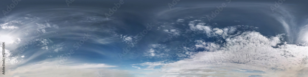 Seamless blue sky hdri panorama 360 degrees angle view with beautiful clouds for use in 3d graphics or game development as sky dome or edit drone shot