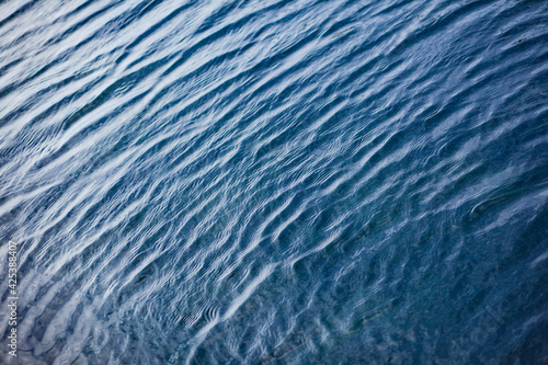 water ripples on the river, lake, sea and ocean