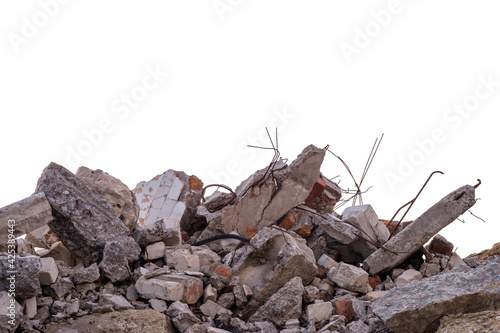 Concrete fragments of a destroyed building isolated on a white background.
