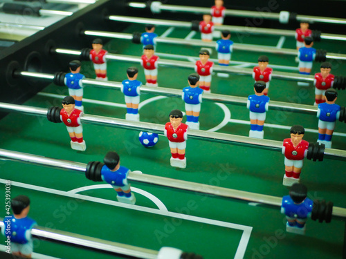 Close-up view of table football. Sport teame football players © Tatsiana
