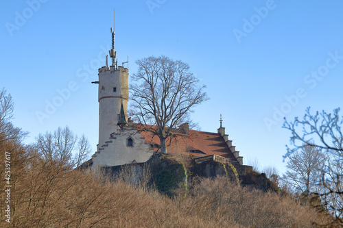 view of a medieva castle in the woodlands on top of a mountain in upper franconia photo