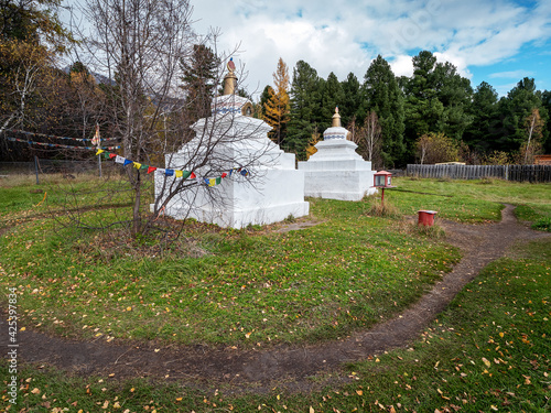 Eastern Sayans, Buryatia. Buddhist stupa in the courtyard of Bodhidharma Datsan in Arshan settlement. photo