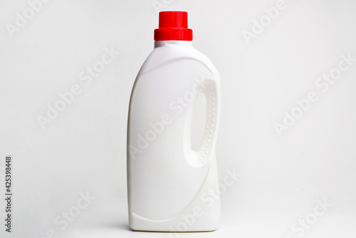 White plastic bottle for liquid laundry detergent, cleaning agent, bleach or fabric softener. Package mockup.