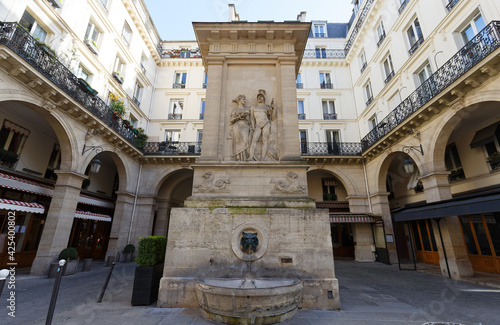 The fountain of Mars located In rue Saint-Dominique, on a little square, Paris, France.