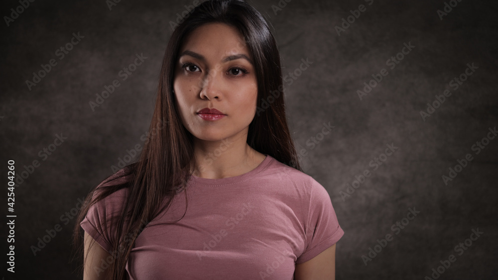 Portrait of a young pretty woman - studio photography