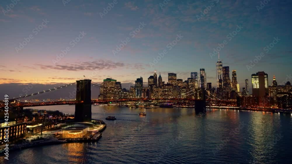 Panoramic view of Brooklyn bridge and Manhattan at night, New York City. Panoramic view of Brooklyn bridge and Manhattan at night, New York City.